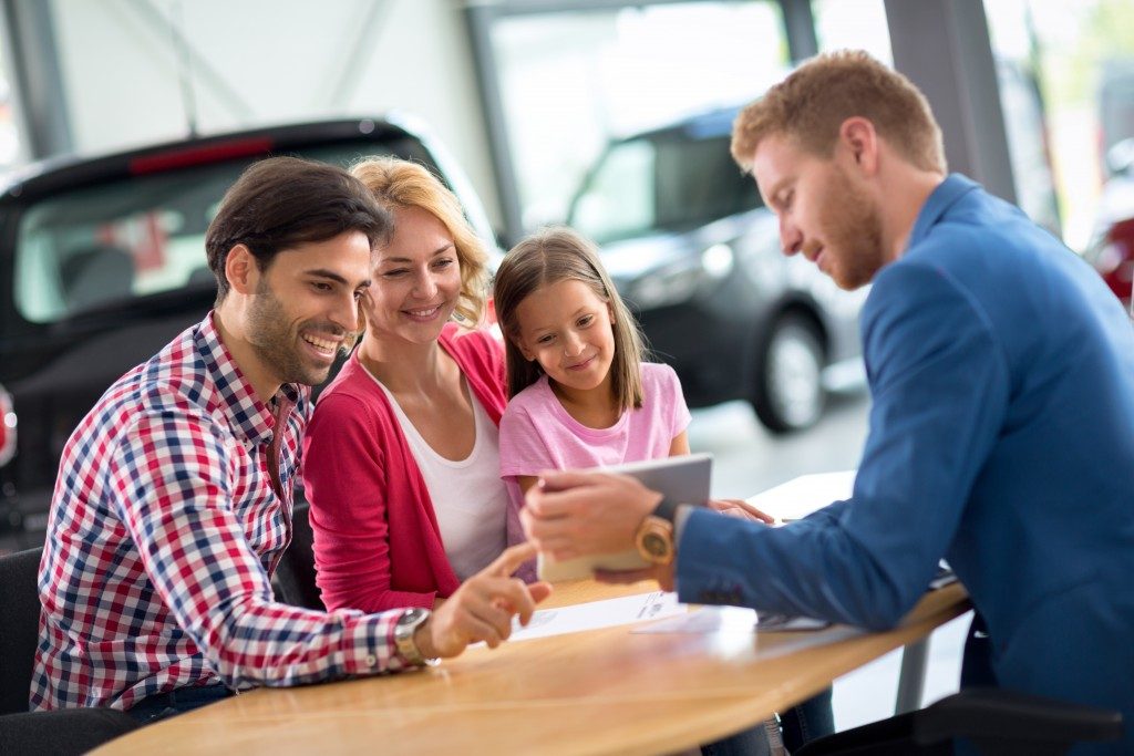 Salesperson talking to the clients
