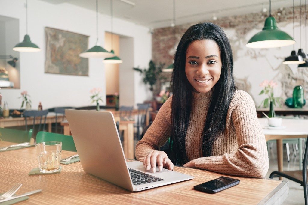 woman using her laptop