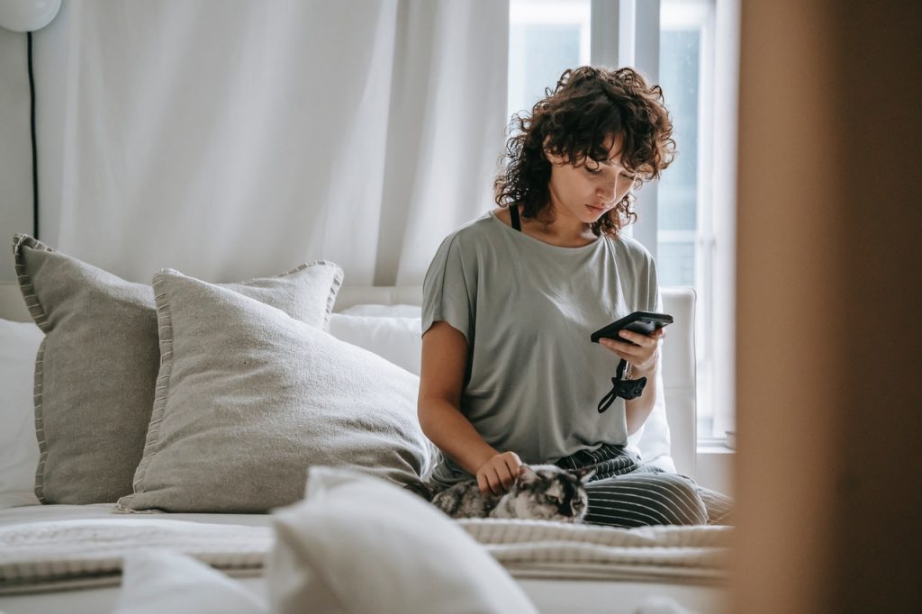 woman looking at her phone